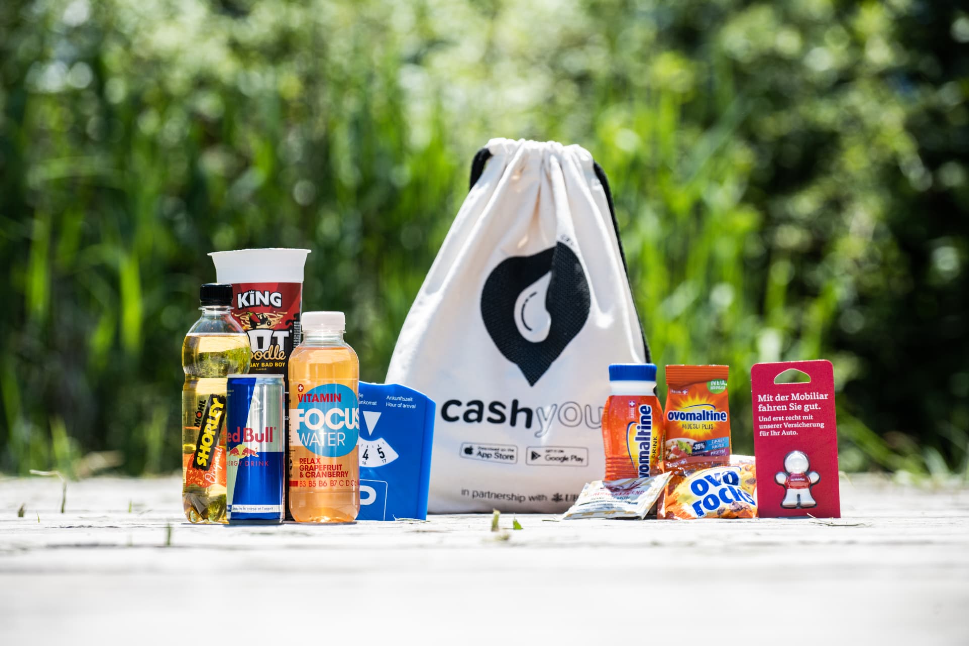 cashyou Goodie Bag mit Produkten von Red Bull, Ovomaltine und weiteren Marken
